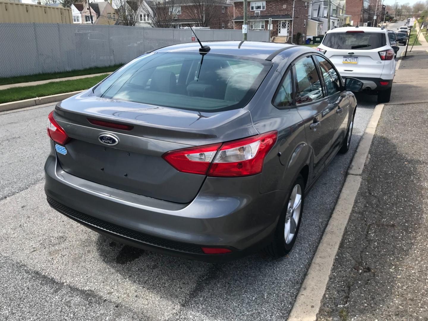 2014 Gray /Gray Ford Focus (1FADP3F23EL) with an 2.0 engine, Automatic transmission, located at 577 Chester Pike, Prospect Park, PA, 19076, (610) 237-1015, 39.886154, -75.302338 - Photo#4